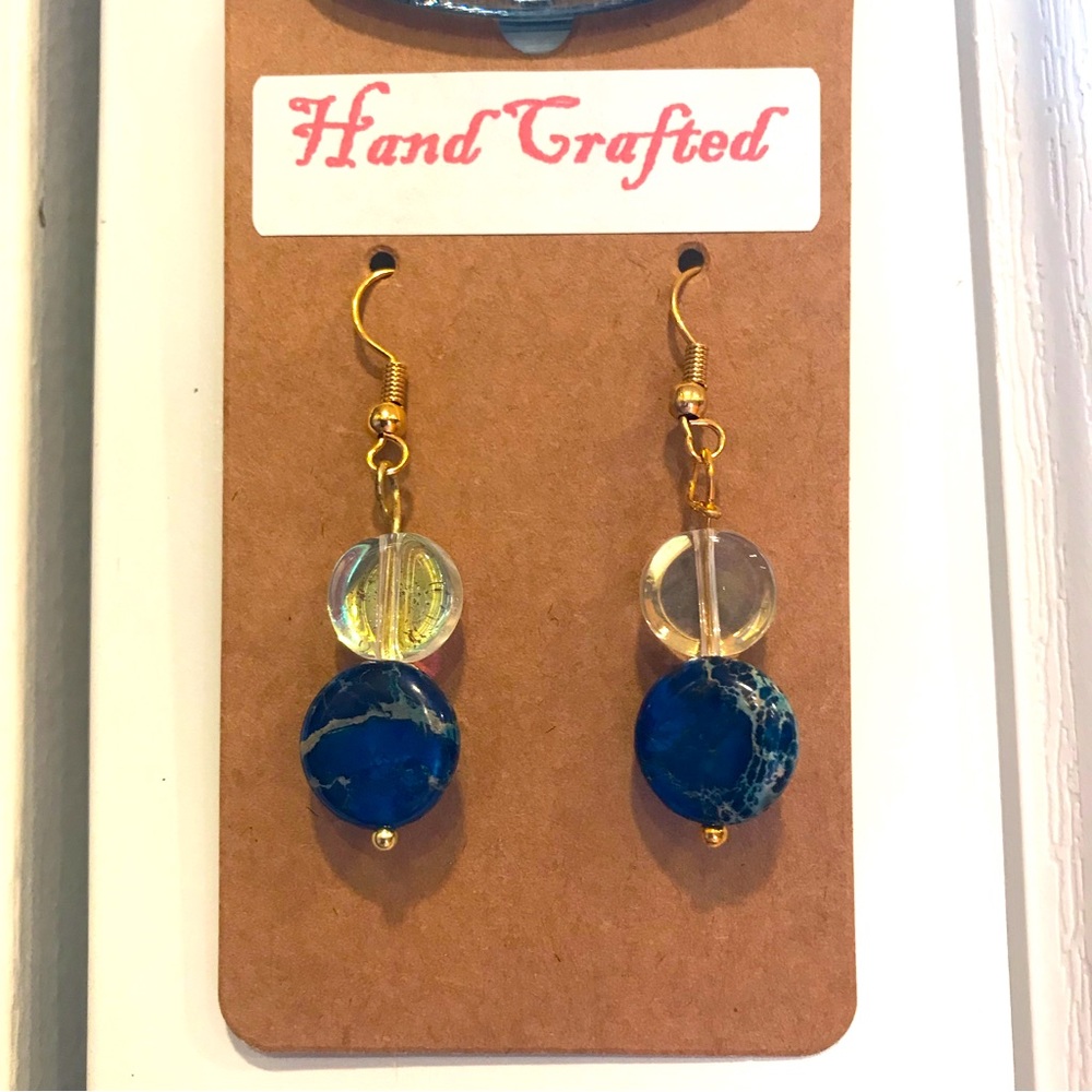 Hand Crafted Earrings w/ blue & clear beads that dangle from gold color wire